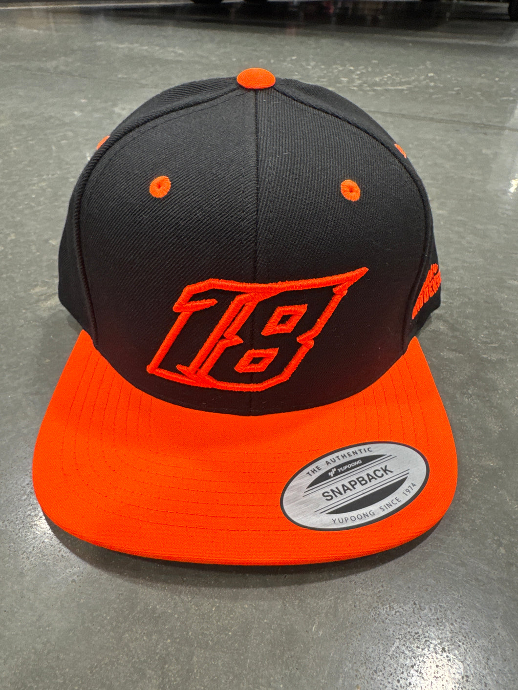 2026 18 Orange and Black Flat Bill